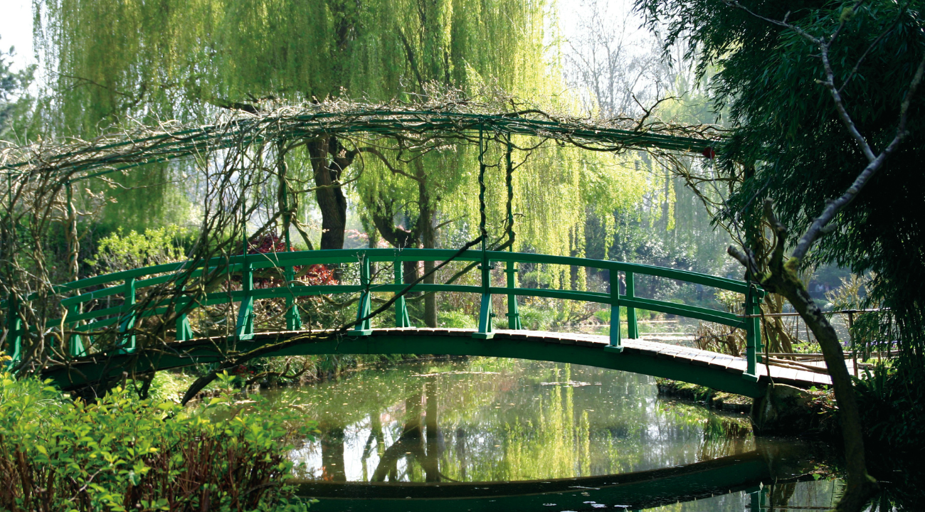 The iconic Japanese Bridge and water lily pond at Claude Monet's gardens in Giverny.