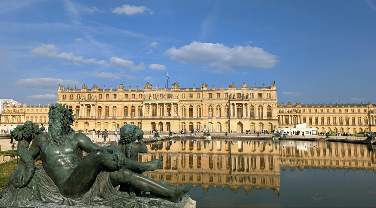The grand exterior of the Palace of Versailles.