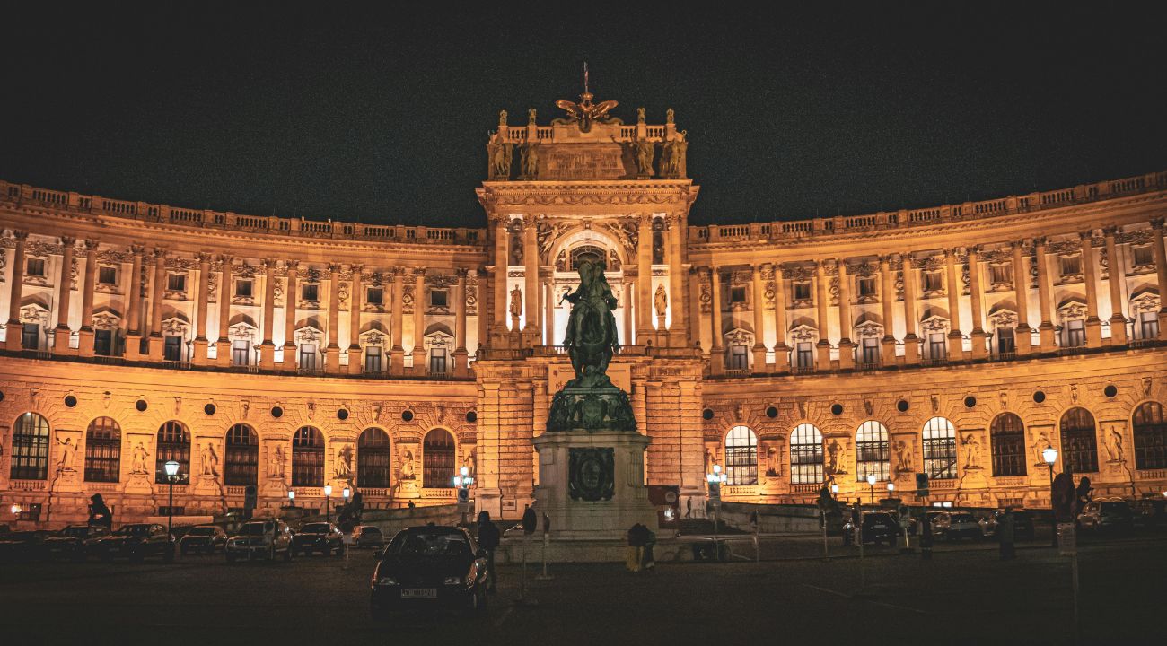 Hofburg Palace in Vienna illuminated at night during spring in Austria