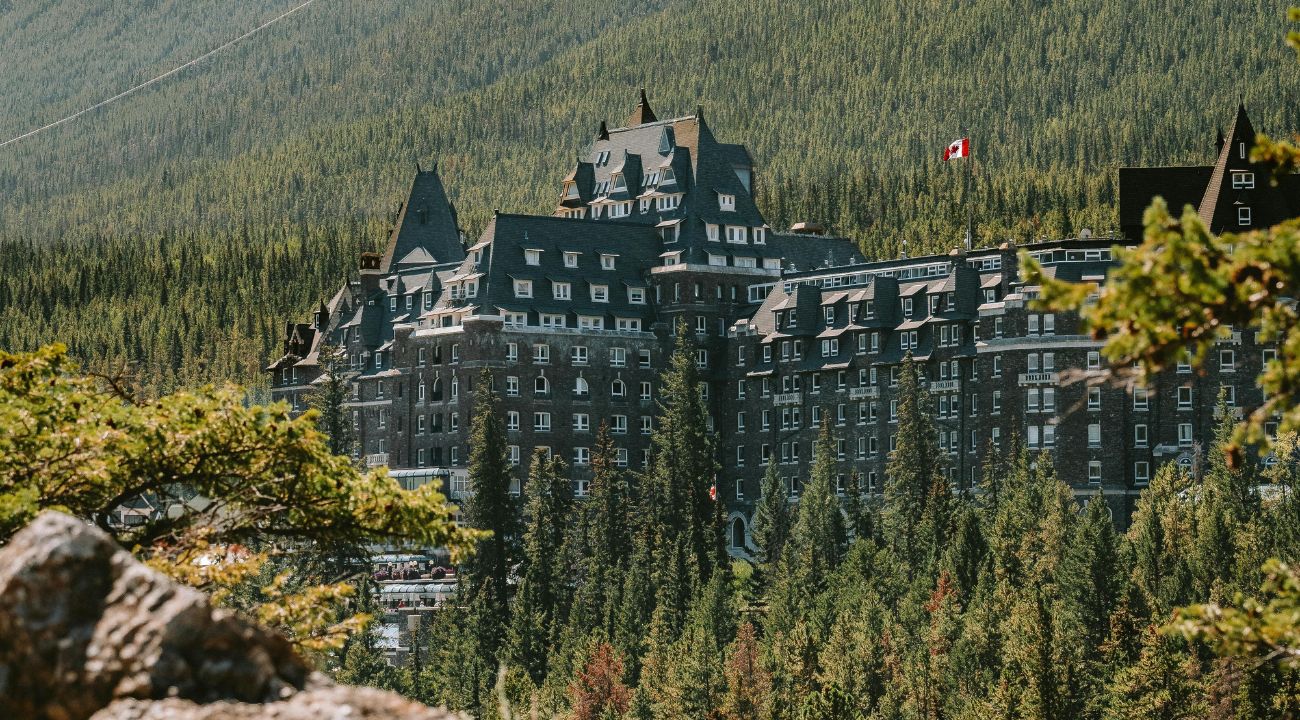 Fairmont Banff Springs Hotel in Banff, Canada set against the Rocky Mountains