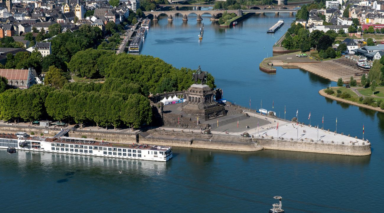 Aerial view of Deutsches Eck in Koblenz at the confluence of the Rhine and Moselle rivers. Rhine river cruise guide