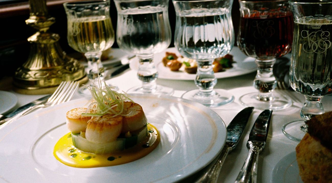 Fine dining dish served onboard a luxury rail journey