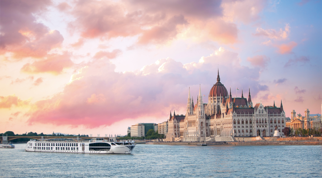 River cruise ship passing the Hungarian Parliament Building in Budapest