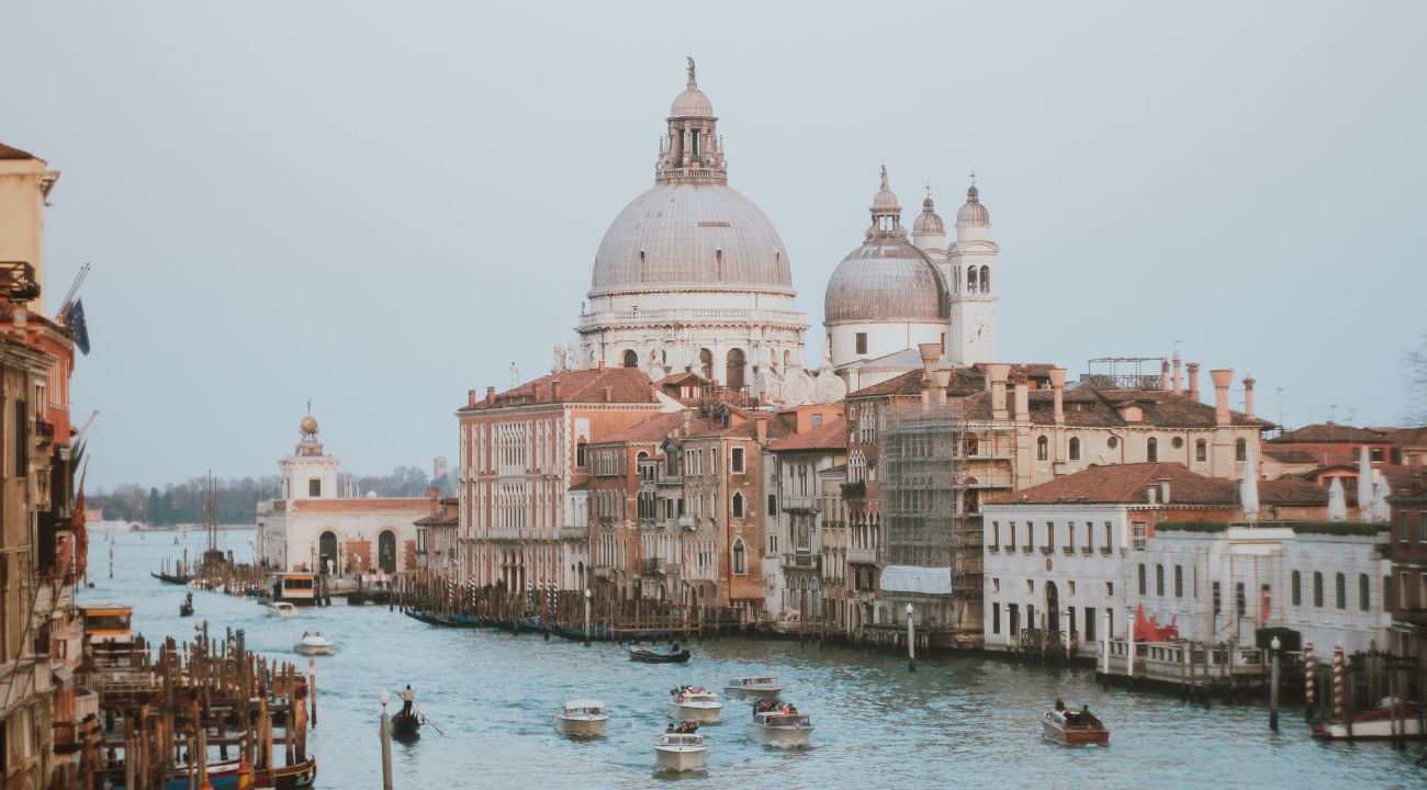 Venice canals and gondolas, one of the best destinations for touring holidays in Italy