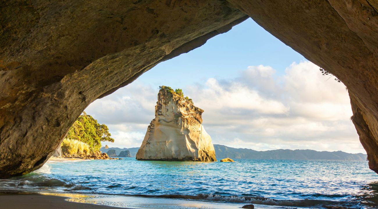 Coastal cathedral rock formation in New Zealand, a natural highlight for touring holidays
