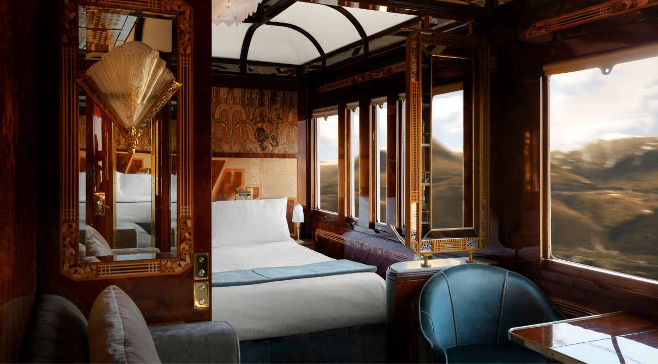 Deluxe luxury train cabins suite aboard the Orient Express with upgraded sleeping and seating space