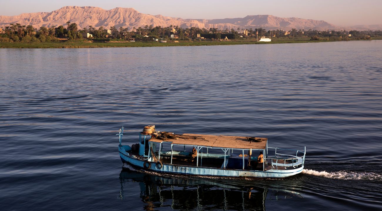 River cruise boat navigating the Nile River in Egypt