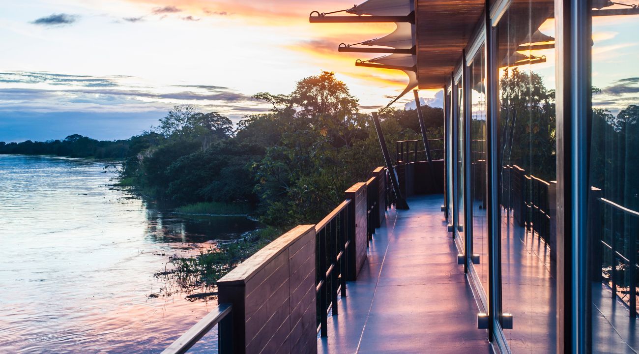 Observation deck of the Aria Amazon luxury river cruise ship sailing on the Amazon River in Peru